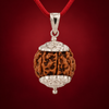 Prospérité — Pendentif Lakshmi | Rudraksha 7 faces